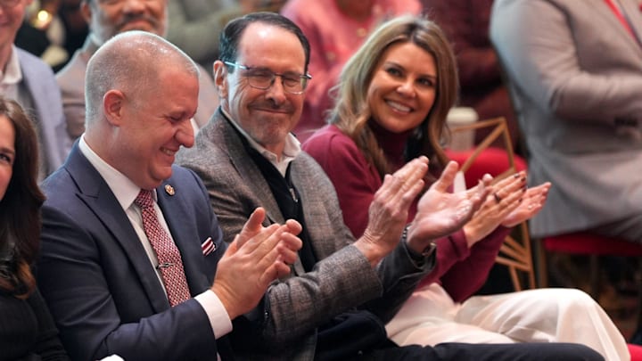 New OU athletic director Roger Denny claps as his family is introduced at the Gaylord Family — Oklahoma Memorial Stadium in Norman, Okla., Wednesday, Jan. 28, 2026. New OU athletic director Roger Denny claps as his family is introduced at the Gaylord Family — Oklahoma Memorial Stadium in Norman, Okla., Wednesday, Jan. 28, 2026.
