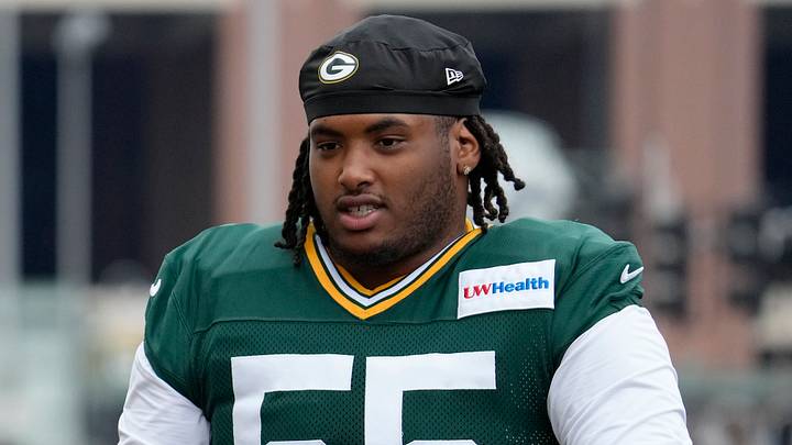 ASHWAUBENON, WISCONSIN - JULY 31: Chris McClellan #55 of the Green Bay Packers rides a bike during the Green Bay Packers training camp at Ray Nitschke Field on July 31, 2026 in Ashwaubenon, Wisconsin.