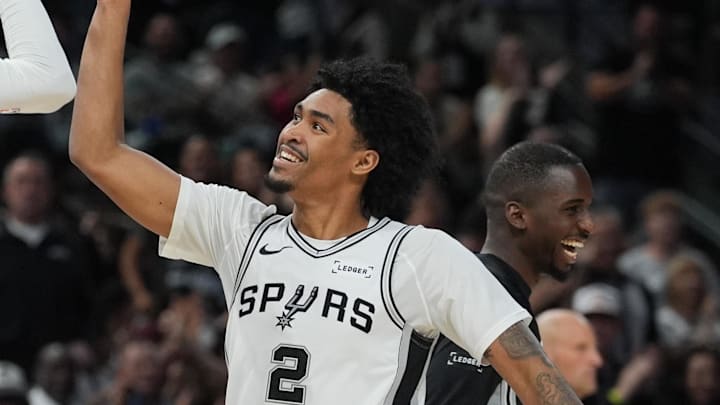 Oct 26, 2025; San Antonio, Texas, USA; San Antonio Spurs forward Victor Wembanyama (1) and guard Dylan Harper (2) celebrates in the second half against the Brooklyn Nets at Frost Bank Center. Mandatory Credit: Daniel Dunn-Imagn Images Oct 26, 2025; San Antonio, Texas, USA; San Antonio Spurs forward Victor Wembanyama (1) and guard Dylan Harper (2) celebrates in the second half against the Brooklyn Nets at Frost Bank Center. Mandatory Credit: Daniel Dunn-Imagn Images