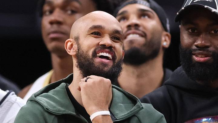 Apr 12, 2026; Boston, Massachusetts, USA; Boston Celtics guard Derrick White (9) reacts during the second half against the Orlando Magic at TD Garden. Mandatory Credit: Paul Rutherford-Imagn Images