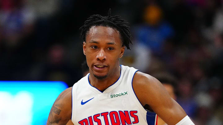 Dec 28, 2024; Denver, Colorado, USA; Detroit Pistons forward Ronald Holland II (00) dribbles up court in the second half against the Denver Nuggets at Ball Arena. Mandatory Credit: Ron Chenoy-Imagn Images