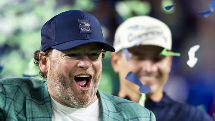Seattle Seahawks general manager John Schneider celebrates with the Vince Lombardi trophy