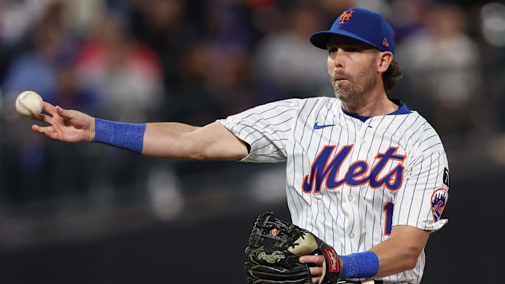 Sep 17, 2025; New York City, New York, USA; New York Mets second baseman Jeff McNeil (1) throws the ball to first base for an out during the sixth inning against the San Diego Padres at Citi Field. Mandatory Credit: Vincent Carchietta-Imagn Images