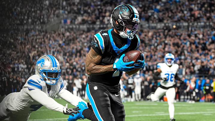 Carolina Panthers wide receiver Tetairoa McMillan makes a catch for a touchdown against Detroit Lions cornerback D.J. Reed (4) Carolina Panthers wide receiver Tetairoa McMillan makes a catch for a touchdown against Detroit Lions cornerback D.J. Reed (4)