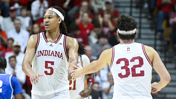 Indiana's Malik Reneau (5) and Trey Galloway (32) high-five against Eastern Illinois at Simon Skjodt Assembly Hall. 