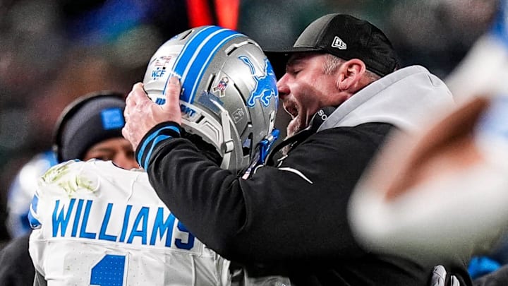 Detroit Lions wide receiver Jameson Williams (1) celebrates a touchdown against Eagles with Dan Campbell