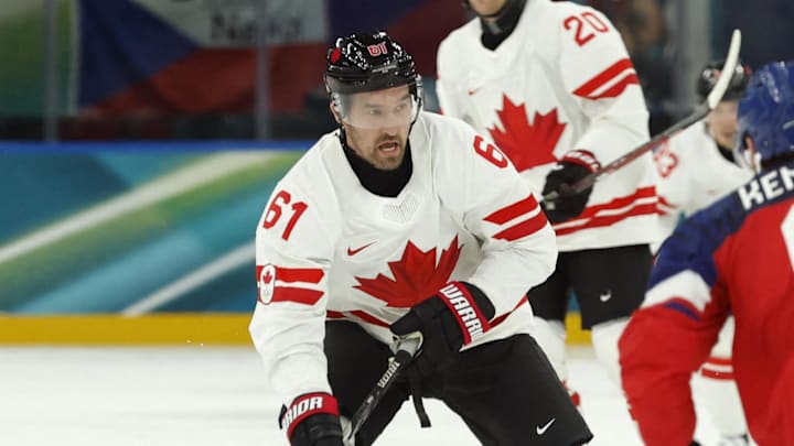 Feb 12, 2026; Milan, Italy; Mark Stone of Canada in action with Michal Kempny of Czechia in a men's ice hockey group A match during the Milano Cortina 2026 Olympic Winter Games at Milano Santagiulia Ice Hockey Arena. Mandatory Credit: Geoff Burke-Imagn Images Feb 12, 2026; Milan, Italy; Mark Stone of Canada in action with Michal Kempny of Czechia in a men's ice hockey group A match during the Milano Cortina 2026 Olympic Winter Games at Milano Santagiulia Ice Hockey Arena. Mandatory Credit: Geoff Burke-Imagn Images