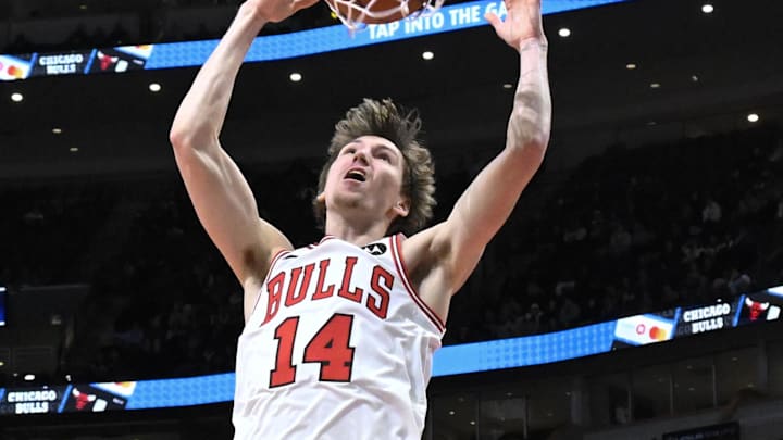 Jan 15, 2025; Chicago, Illinois, USA;  Chicago Bulls forward Matas Buzelis (14) shoots against the Atlanta Hawks during the first half at the United Center. Mandatory Credit: Matt Marton-Imagn Images