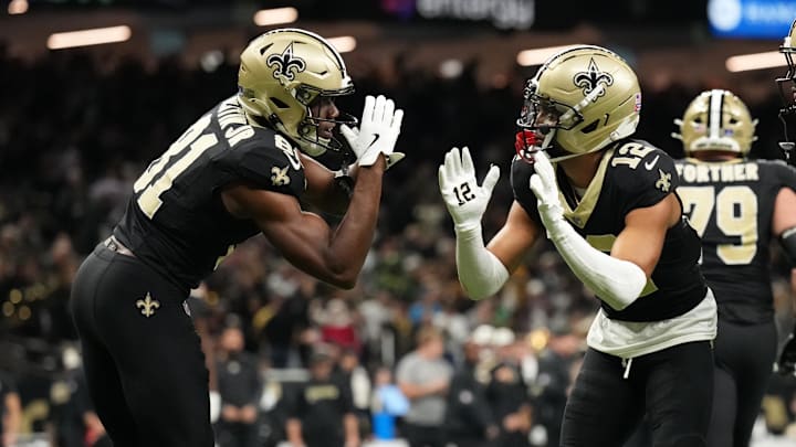 New Orleans Saints wide receiver Chris Olave (12) celebrates with wide receiver Kevin Austin Jr. (81) New Orleans Saints wide receiver Chris Olave (12) celebrates with wide receiver Kevin Austin Jr. (81)