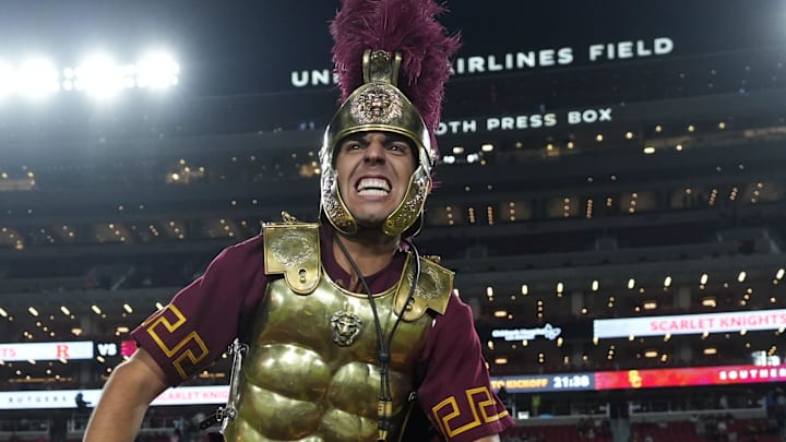 Oct 25, 2024; Los Angeles, California, USA; Southern California Trojans mascot Tommy Trojan leads the Spirit of Troy marching band onto the field during the game against the Rutgers Scarlet Knights at United Airlines Field at Los Angeles Memorial Coliseum. Mandatory Credit: Kirby Lee-Imagn Images Oct 25, 2024; Los Angeles, California, USA; Southern California Trojans mascot Tommy Trojan leads the Spirit of Troy marching band onto the field during the game against the Rutgers Scarlet Knights at United Airlines Field at Los Angeles Memorial Coliseum. Mandatory Credit: Kirby Lee-Imagn Images