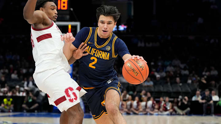 Mar 12, 2025; Charlotte, NC, USA; California Golden Bears guard Andrej Stojakovic (2) with the ball as Stanford Cardinal guard Jaylen Blakes (21) defends in the second half at Spectrum Center. Mandatory Credit: Bob Donnan-Imagn Images Mar 12, 2025; Charlotte, NC, USA; California Golden Bears guard Andrej Stojakovic (2) with the ball as Stanford Cardinal guard Jaylen Blakes (21) defends in the second half at Spectrum Center. Mandatory Credit: Bob Donnan-Imagn Images