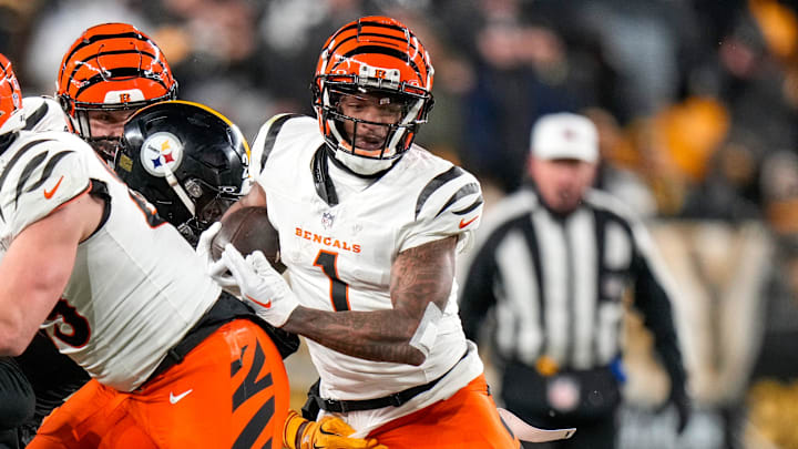 Cincinnati Bengals wide receiver Ja'Marr Chase (1) runs with a catch in the fourth quarter of the NFL Week 18 game between the Pittsburgh Steelers and the Cincinnati Bengals at Acrisure Stadium in Pittsburgh on Saturday, Jan. 4, 2025. The Bengals won 19-17 to finish the regular season at 9-8. Cincinnati Bengals wide receiver Ja'Marr Chase (1) runs with a catch in the fourth quarter of the NFL Week 18 game between the Pittsburgh Steelers and the Cincinnati Bengals at Acrisure Stadium in Pittsburgh on Saturday, Jan. 4, 2025. The Bengals won 19-17 to finish the regular season at 9-8.