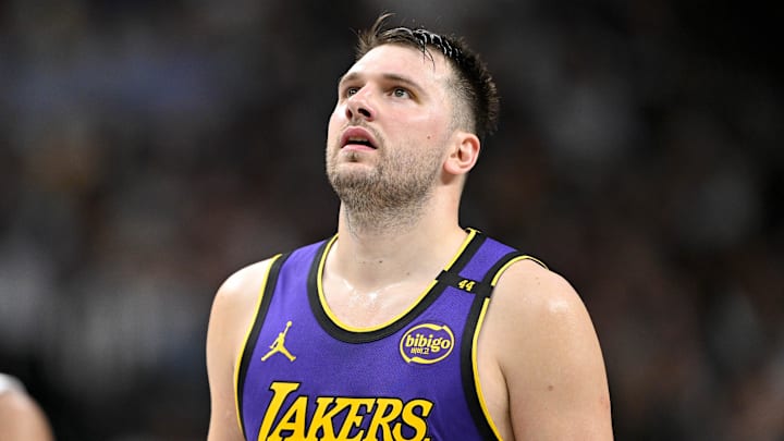 Apr 9, 2025; Dallas, Texas, USA; Dallas Mavericks guard Max Christie (00) and Los Angeles Lakers guard Luka Doncic (77) during the game between the Dallas Mavericks and the Los Angeles Lakers at American Airlines Center. Mandatory Credit: Jerome Miron-Imagn Images