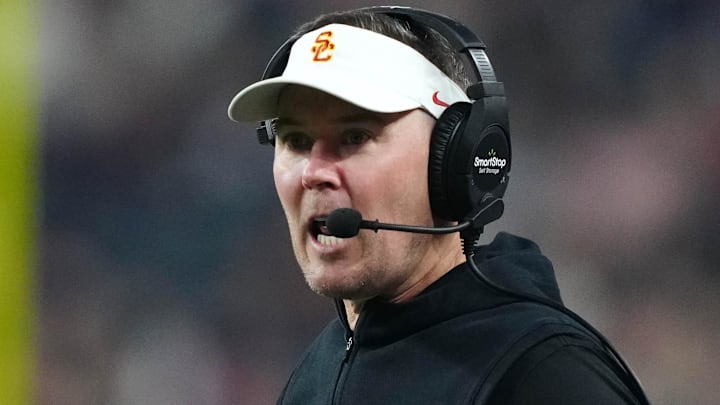 Dec 27, 2024; Las Vegas, NV, USA; Southern California Trojans head coach Lincoln Riley reacts against the Texas A&M Aggies in the first half at Allegiant Stadium. Mandatory Credit: Kirby Lee-Imagn Images Dec 27, 2024; Las Vegas, NV, USA; Southern California Trojans head coach Lincoln Riley reacts against the Texas A&M Aggies in the first half at Allegiant Stadium. Mandatory Credit: Kirby Lee-Imagn Images