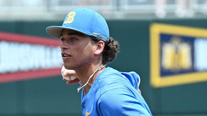 Jun 14, 2025; Omaha, Neb, USA; UCLA Bruins second baseman Phoenix Call (4) flips the ball to first base against the Murray State Racers during the fourth inning at Charles Schwab Field. Mandatory Credit: Steven Branscombe-Imagn Images Jun 14, 2025; Omaha, Neb, USA; UCLA Bruins second baseman Phoenix Call (4) flips the ball to first base against the Murray State Racers during the fourth inning at Charles Schwab Field. Mandatory Credit: Steven Branscombe-Imagn Images