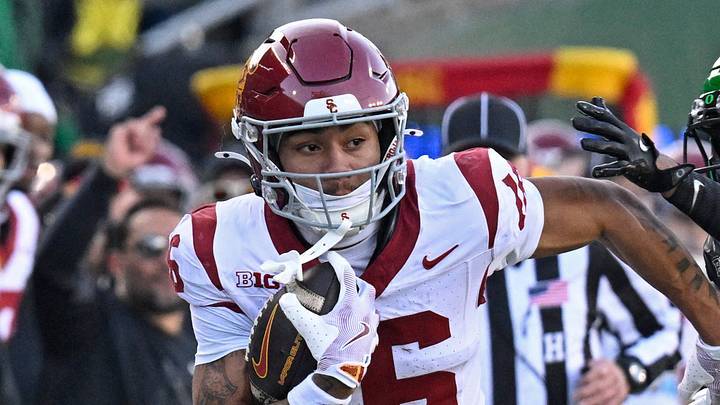 Nov 22, 2025; Eugene, Oregon, USA; Southern California Trojans wide receiver Tanook Hines (16) runs with the ball during the first half against the Oregon Ducks at Autzen Stadium. Mandatory Credit: Troy Wayrynen-Imagn Images Nov 22, 2025; Eugene, Oregon, USA; Southern California Trojans wide receiver Tanook Hines (16) runs with the ball during the first half against the Oregon Ducks at Autzen Stadium. Mandatory Credit: Troy Wayrynen-Imagn Images