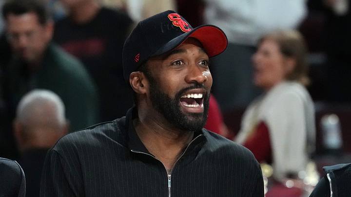 Jan 31, 2026; Los Angeles, California, USA; Gilbert Arenas (r9ght) and wife Melli Monaco attend the game between the Rutgers Scarlet Knights and the Southern California Trojans at Galen Center. Mandatory Credit: Kirby Lee-Imagn Images