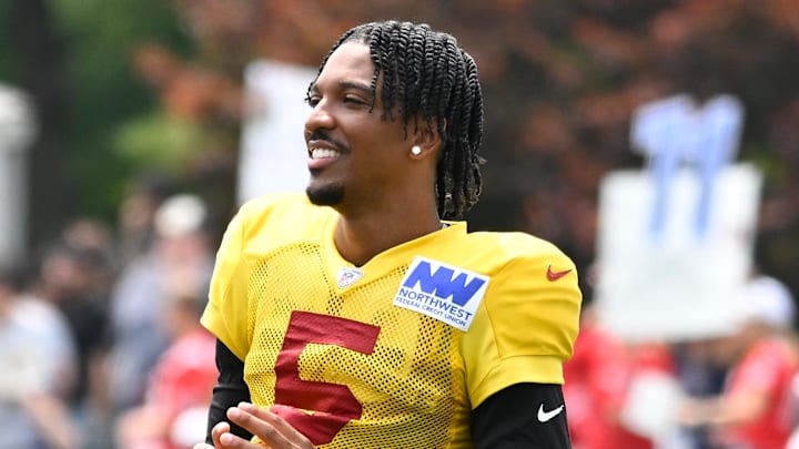 Aug 6, 2025; Foxborough, MA, USA; New England Patriots offensive tackle Will Campbell (66) and Washington Commanders quarterback Jayden Daniels (5) talk after training camp at Gillette Stadium. Mandatory Credit: Eric Canha-Imagn Images Aug 6, 2025; Foxborough, MA, USA; New England Patriots offensive tackle Will Campbell (66) and Washington Commanders quarterback Jayden Daniels (5) talk after training camp at Gillette Stadium. Mandatory Credit: Eric Canha-Imagn Images