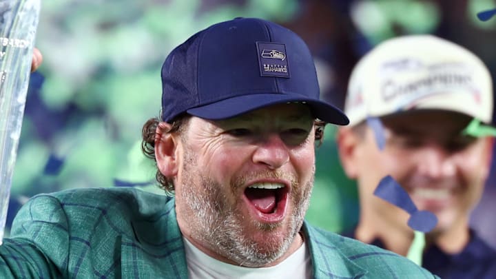 Seattle Seahawks general manager John Schneider celebrates with the Vince Lombardi trophy. Seattle Seahawks general manager John Schneider celebrates with the Vince Lombardi trophy.