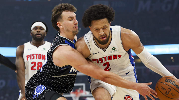 Apr 25, 2026; Orlando, Florida, USA; Orlando Magic forward Franz Wagner (22) guards Detroit Pistons guard Cade Cunningham (2) in the first quarter during game three of the first round of the 2026 NBA Playoffs at Kia Center. Mandatory Credit: Nathan Ray Seebeck-Imagn Images