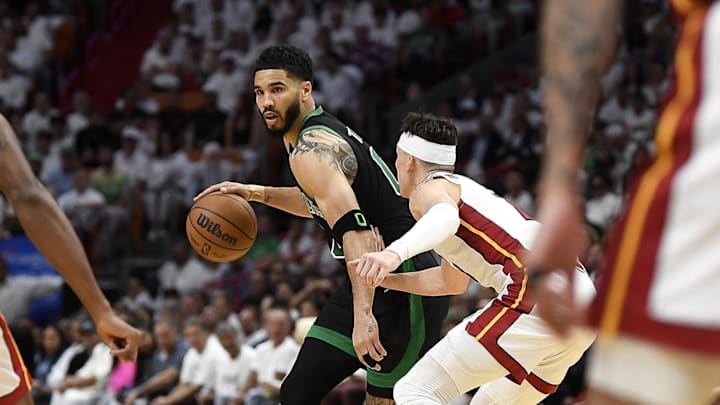 Boston Celtics forward Jayson Tatum (0) looks through the Miami