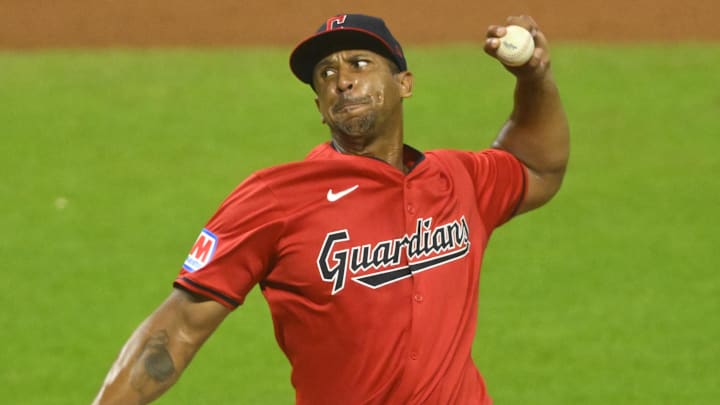 Aug 27, 2024; Cleveland, Ohio, USA; Cleveland Guardians relief pitcher Anthony Gose (26) delivers a pitch in the seventh inning against the Kansas City Royals at Progressive Field. Mandatory Credit: David Richard-Imagn Images