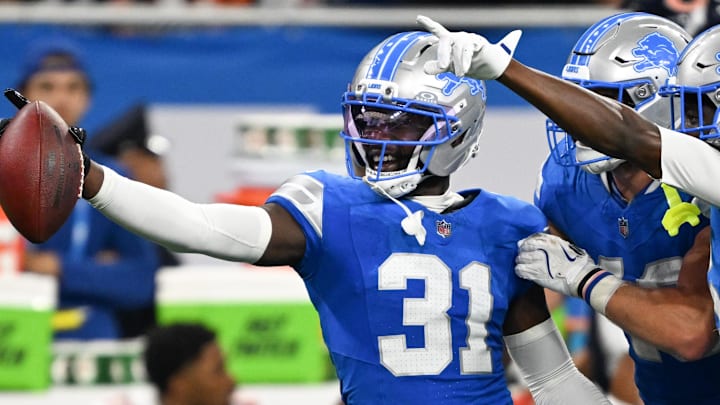 Detroit Lions safety Kerby Joseph (31) celebrates with teammates after inception against the Chicago Bears