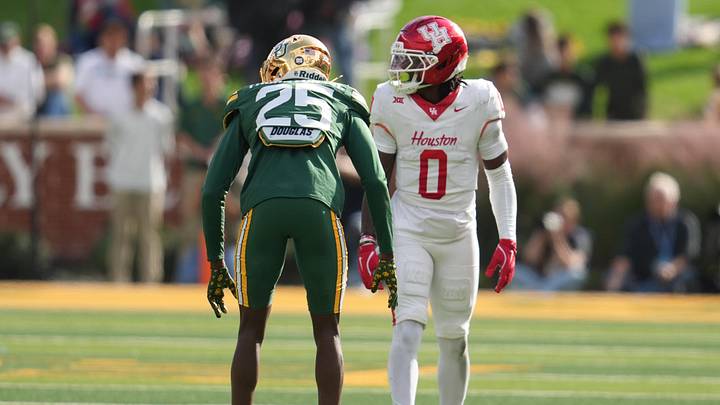 Nov 29, 2025; Waco, Texas, USA; Houston Cougars wide receiver Amare Thomas (0) in action against Baylor Bears cornerback Levar Thornton Jr. (25) during the second half at McLane Stadium. Mandatory Credit: Chris Jones-Imagn Images Nov 29, 2025; Waco, Texas, USA; Houston Cougars wide receiver Amare Thomas (0) in action against Baylor Bears cornerback Levar Thornton Jr. (25) during the second half at McLane Stadium. Mandatory Credit: Chris Jones-Imagn Images