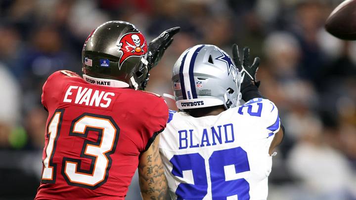 Dec 22, 2024; Arlington, Texas, USA; Dallas Cowboys cornerback DaRon Bland (26) defends a pass against Tampa Bay Buccaneers wide receiver Mike Evans (13) in the third quarter at AT&T Stadium. Mandatory Credit: Tim Heitman-Imagn Images