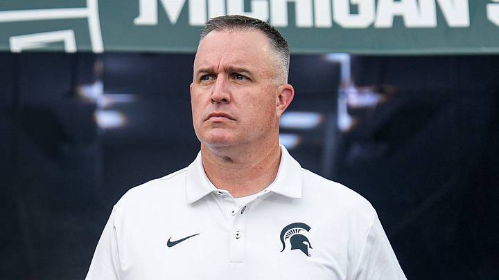 Michigan State head coach Pat Fitzgerald walks onto the field for practice ahead of the Toledo game at Spartan Stadium in East Lansing on Friday, Sept. 4, 2026. Michigan State head coach Pat Fitzgerald walks onto the field for practice ahead of the Toledo game at Spartan Stadium in East Lansing on Friday, Sept. 4, 2026.