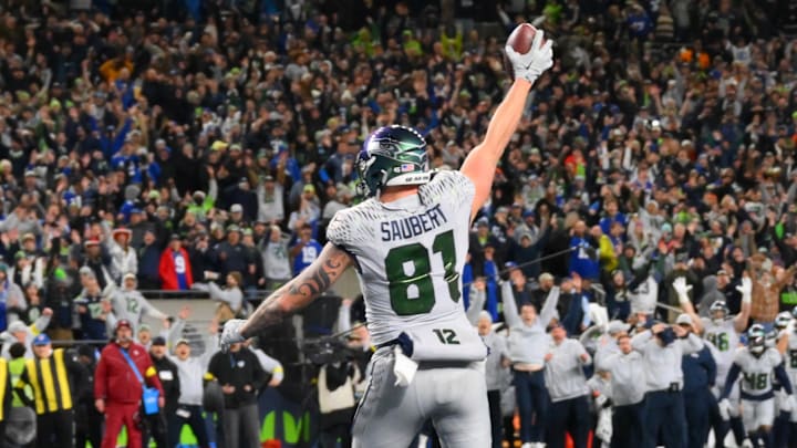The Seahawks prevailed against the Rams in overtime on a two-point conversion caught by tight end Eric Saubert