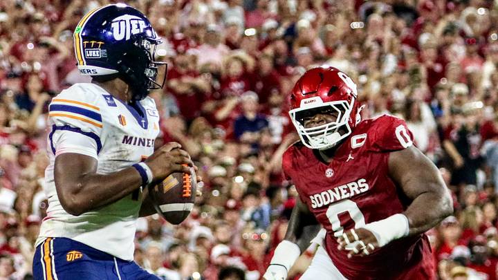 Oklahoma defensive lineman David Stone pursues UTEP quarterback EJ Colson. Oklahoma defensive lineman David Stone pursues UTEP quarterback EJ Colson.