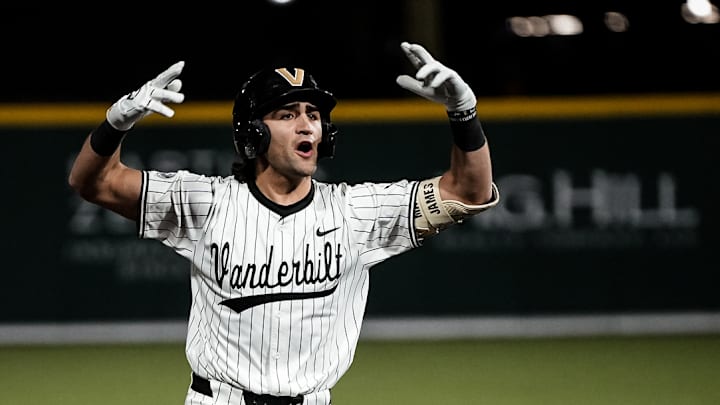 Chris Maldonado rounds the bases after hitting a three-run home run. Chris Maldonado rounds the bases after hitting a three-run home run.