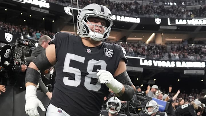 Dec 22, 2024; Paradise, Nevada, USA; Las Vegas Raiders guard Jackson Powers-Johnson (58) enters the field before the game against the Jacksonville Jaguars at Allegiant Stadium. Mandatory Credit: Kirby Lee-Imagn Images
