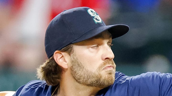 Seattle Mariners pitcher Collin Snider (52) comes on to pitch during the sixth inning against the Texas Rangers at Globe Life Field in 2024. Seattle Mariners pitcher Collin Snider (52) comes on to pitch during the sixth inning against the Texas Rangers at Globe Life Field in 2024.