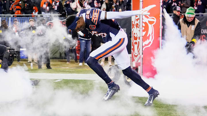 Dec 20, 2025; Chicago, Illinois, USA; Chicago Bears cornerback Nahshon Wright (26) runs onto the field during player introductions before the game against the Green Bay Packers at Soldier Field.