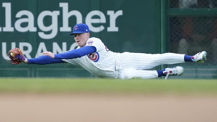 Chicago Cubs center fielder Pete Crow-Armstrong (4) makes a diving catch against the San Diego Padres at Wrigley Field. 