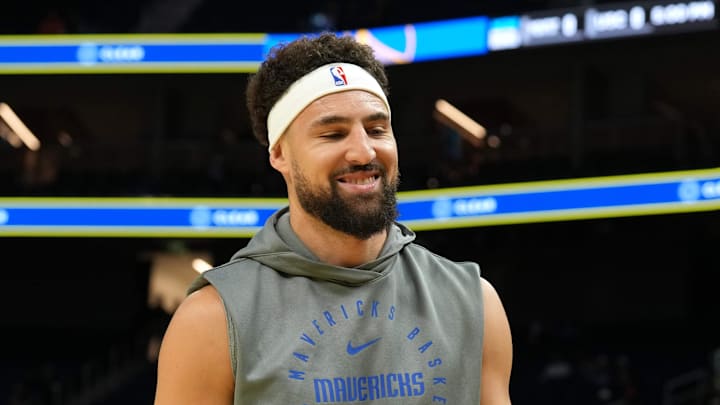 Dec 15, 2024; San Francisco, California, USA; Dallas Mavericks guard Klay Thompson (31) reacts as fans cheer before the game against the Golden State Warriors at Chase Center. Mandatory Credit: Darren Yamashita-Imagn Images