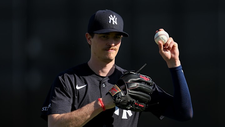 New York Yankees pitcher Max Fried warms up at the team's training facility.