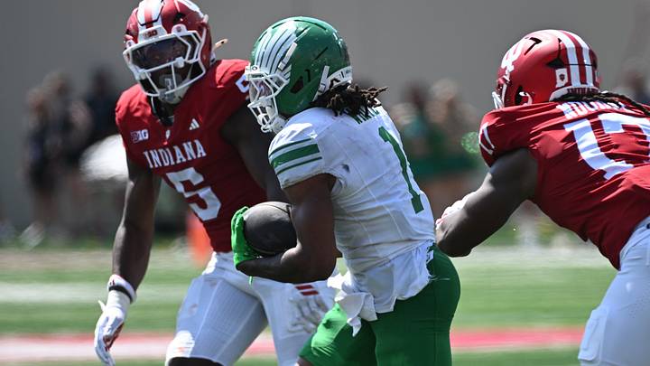 Sep 5, 2026; Bloomington, Indiana, USA; North Texas Mean Green running back Jahiem White (1) carries the ball as Indiana Hoosiers linebacker Rolijah Hardy (5) and defensive lineman Daniel Ndukwe (17) defend during the second quarter at Merchants Bank Field at Memorial Stadium. Mandatory Credit: Robert Goddin-Imagn Images Sep 5, 2026; Bloomington, Indiana, USA; North Texas Mean Green running back Jahiem White (1) carries the ball as Indiana Hoosiers linebacker Rolijah Hardy (5) and defensive lineman Daniel Ndukwe (17) defend during the second quarter at Merchants Bank Field at Memorial Stadium. Mandatory Credit: Robert Goddin-Imagn Images