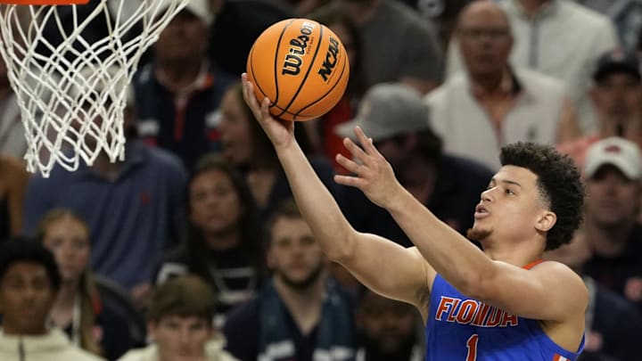 Florida Gators star Walter Clayton Jr. shoots a basket.