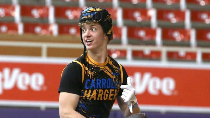 The Carroll Chargers’ Jaxx DeJean warms up before a 7-on-7 football tournament game Saturday, April 13, 2024 at the UNI Dome in Cedar Falls, Iowa.