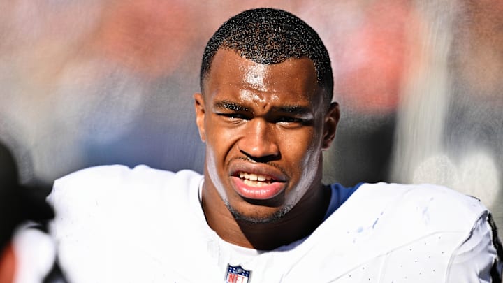 Oct 22, 2023; Chicago, Illinois, USA;  Las Vegas Raiders defensive end Tyree Wilson (9) takes a breather on the sidelines against the Chicago Bears at Soldier Field. Mandatory Credit: Jamie Sabau-Imagn Images