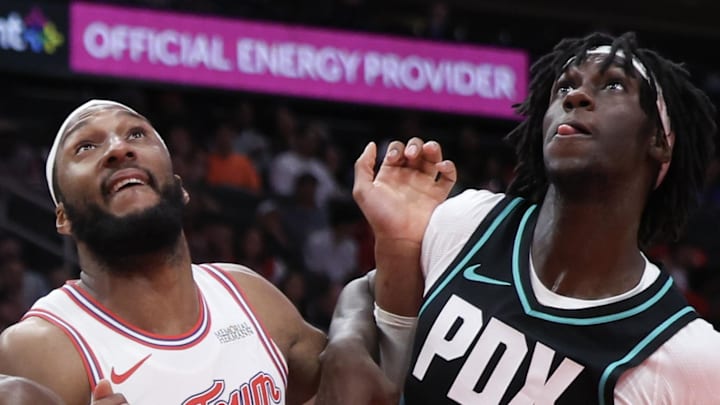 Portland Trail Blazers guard Sidy Cissoko tries to box out Houston Rockets guard Josh Okogie.