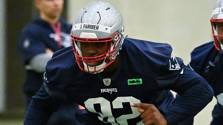 May 9, 2025; Foxborough, MA, USA; New England Patriots defensive tackle Joshua Farmer (92) works out during rookie camp at Gillette Stadium. Mandatory Credit: Eric Canha-Imagn Images