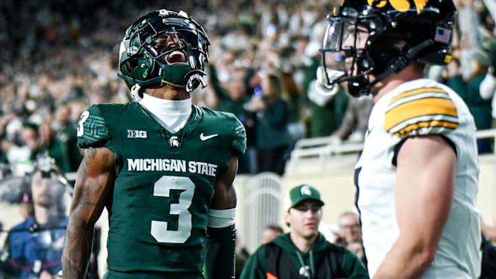 Michigan State's Montorie Foster Jr., left, celebrates his touchdown catch against Iowa during the third quarter on Saturday, Oct. 19, 2024, at Spartan Stadium in East Lansing.