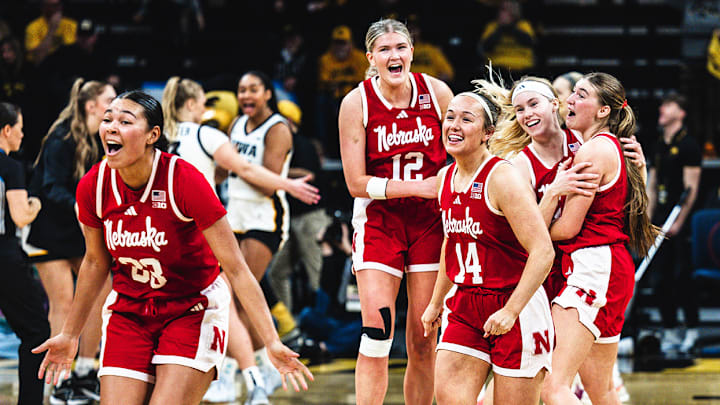The Huskers celebrate their overtime win in Iowa City last month.