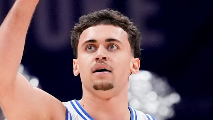Mar 14, 2026; Charlotte, NC, USA; Duke Blue Devils guard Darren Harris (8) celebrates after a play against the Virginia Cavaliers during the men's ACC Conference Tournament Championship at Spectrum Center. Mandatory Credit: Jim Dedmon-Imagn Images