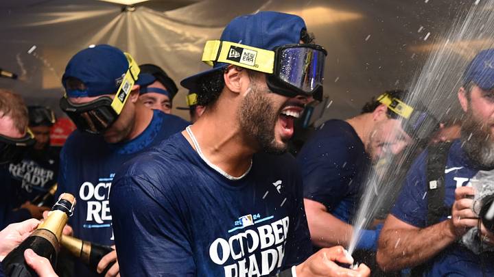 Oct 2, 2024; Baltimore, Maryland, USA; Kansas City Royals players celebrate in the locker room after defeating the Baltimore Orioles in game two of the Wild Card round for the 2024 MLB Playoffs at Oriole Park at Camden Yards. Mandatory Credit: Tommy Gilligan-Imagn Images
