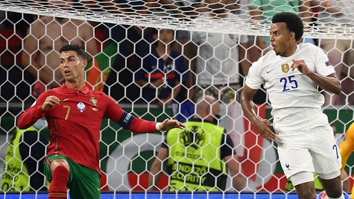 Cristiano Ronaldo y Jules Koundé